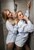 wetfoto two girls get soaking wet bathtub clothed nylons shirt