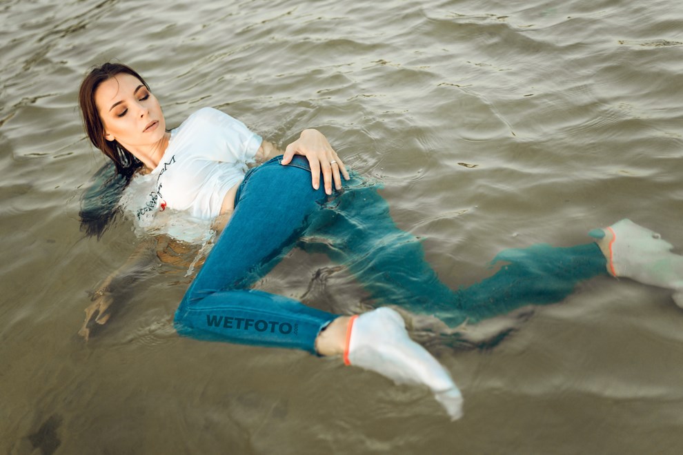 girl swims clothed skinny jeans t shirt socks wetfoto