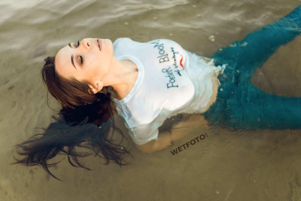 girl swims clothed skinny jeans t shirt socks wetfoto