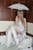 wet girl get wet wet hair fully clothed wedding dress stockings leather boots umbrella bath shower