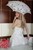 wet girl get wet wet hair fully clothed wedding dress stockings leather boots umbrella bath shower