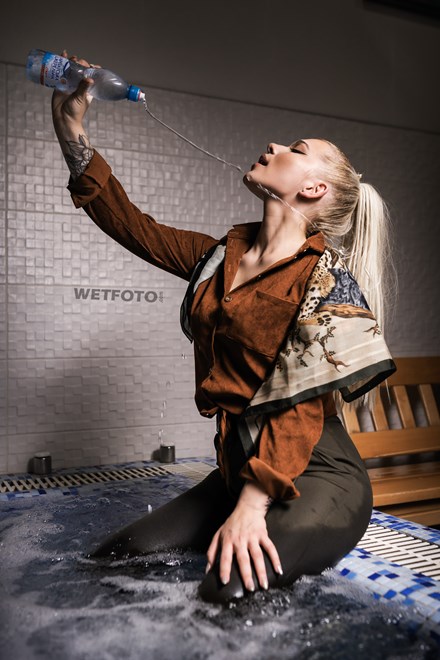 wetfoto blonde girl tight pants shoes corduroy shirt get wet pool