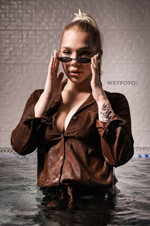 #570 - Hot Blonde in a Corduroy Shirt and Skinny Pants with Shoes Gets Wet in the Pool