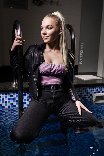 wetfoto swimming fully clothed in pool