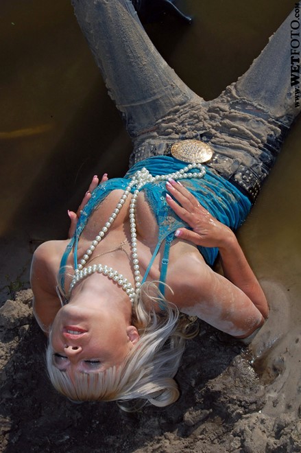 wet girl get wet fully clothed soaking wet t-shirt jeans high heels lake