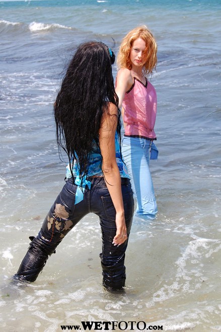 wet girl wet hair get wet swim fully clothed top jeans high heels leather boots fully soaked sea
