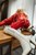 wet red vinyl catsuit wetfoto