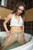 wet girl get wet wet hair fully clothed pants blouse high heels bath