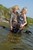 wet girl get wet fully clothed bodysuit top jeans leather boots lake
