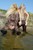 wet girl get wet fully clothed bodysuit top jeans leather boots lake