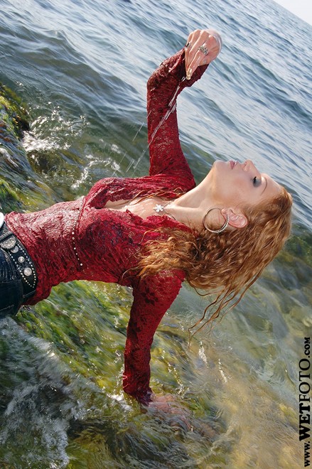 wet girl get wet wet hair fully clothed wet hair fully clothed blouse denim skirt leggings shoes sea