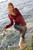 wet girl get wet wet hair fully clothed wet hair fully clothed blouse denim skirt leggings shoes sea