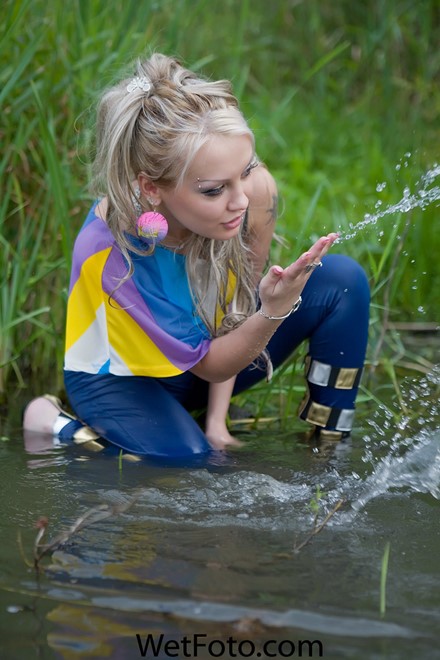 wet girl get wet fully clothed blouse leggings leather belt shoes river