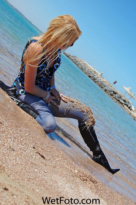 wet girl get wet wet hair fully clothed dress stockings boots sea
