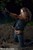 wet girl get wet fully clothed vest fur t-shirt jeans socks mud