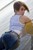 wet girl get wet wet hair fully clothed cloak jeans t-shirt shoes lake