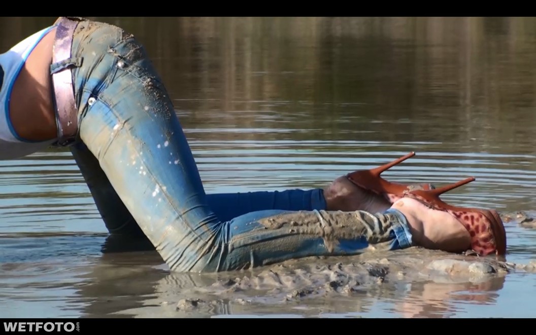 wet girl get wet fully clothed jacket jeans denim bodysuit shoes lake