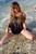wet girl wet hair get wet swim fully clothed tunic fishnet tights high heels boots fully soaked sea