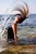 wet girl wet hair get wet swim fully clothed tunic fishnet tights high heels boots fully soaked sea