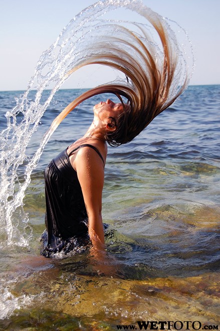 wet girl wet hair get wet swim fully clothed tunic fishnet tights high heels boots fully soaked sea
