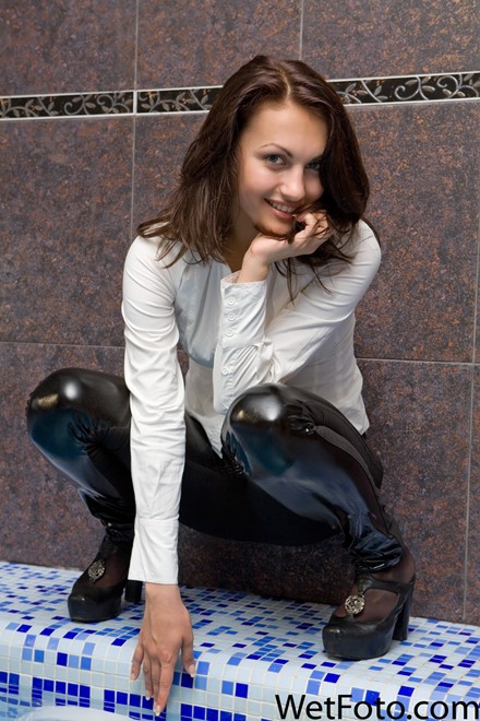 wet girl get wet wet hair fully clothed leggings shirt tights high heels pool