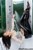 wet girl get wet wet hair fully clothed leggings shirt tights high heels pool