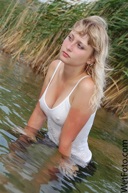 wet woman get wet fully clothed jacket jeans t-shirt shoes lake
