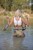 wet girl get wet fully clothed stockings top denim shorts shoes heels lake