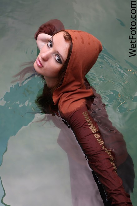 wet girl get wet wet hair swim fully clothed sweater leggings tights high heels pool